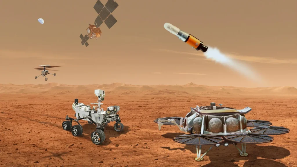 Esta ilustração mostra um conceito com vários robôs que trabalhariam em conjunto para transportar até a Terra amostras de rochas e solo que estão sendo coletadas na superfície de Marte pelo rover Perseverance da NASA.Crédito: NASA/ESA/JPL-Caltech